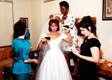 Cinthia Moore and crew applying makeup for a bride before her wedding.